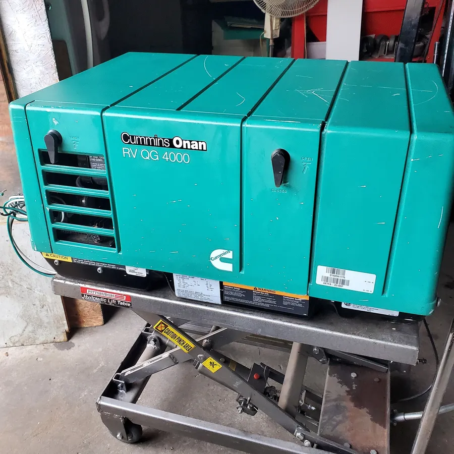 Rebuilt Onan QG 4000 RV generator on the shop stand